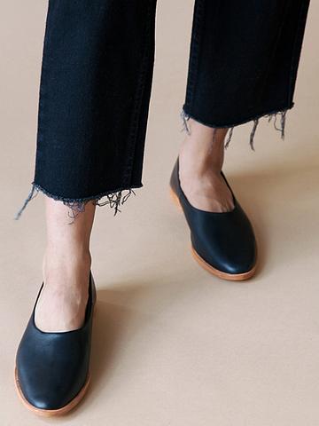 Black leather clarity flats