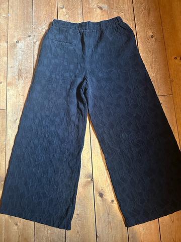 Wide leg pants.