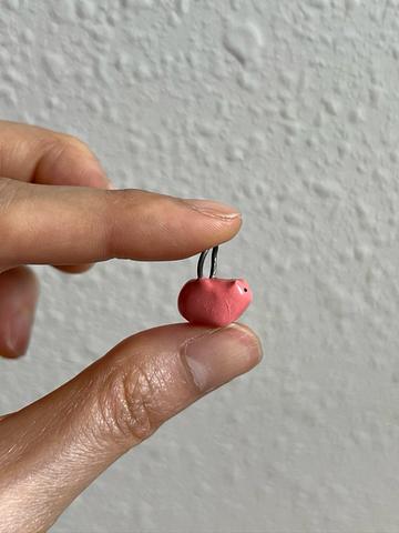 Ceramic pink pig charm