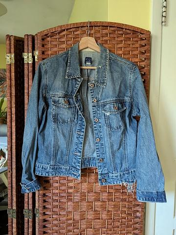 Distressed denim jacket