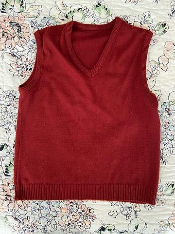 Red v-neck sweater vest