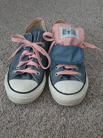 Blue and salmon double tongue Chuck Taylor low top sneakers