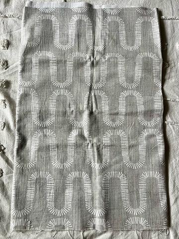Grey and white squiggle print textured upholstery fabric