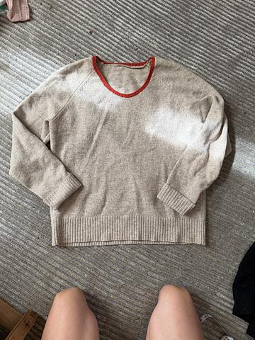 Sweater with hand knit collar