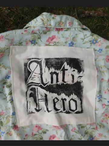 Anti hero block print on button up