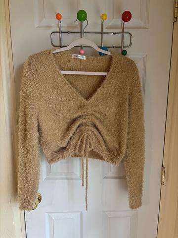 Sand colored fuzzy top