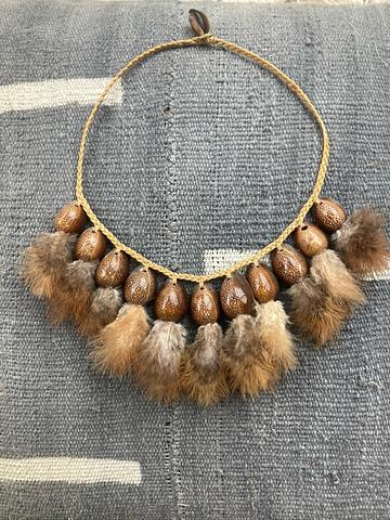 Feathers and shells woven cord