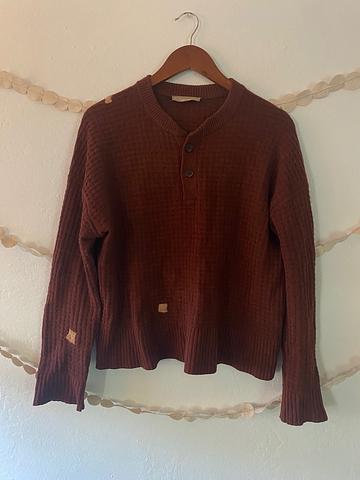 Cashmere sweater with darned patches