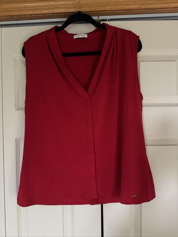 Red sleeveless top