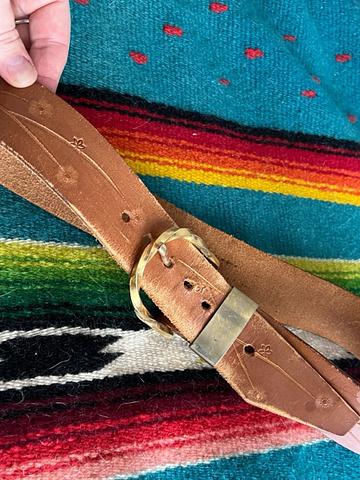 Stamped leather belt