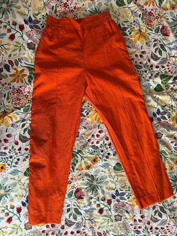Orange track-style pants