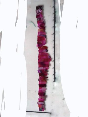 Neon pink agate graduated stick beads