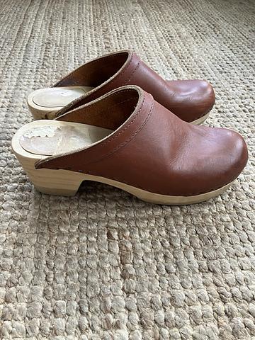 Brown leather clogs