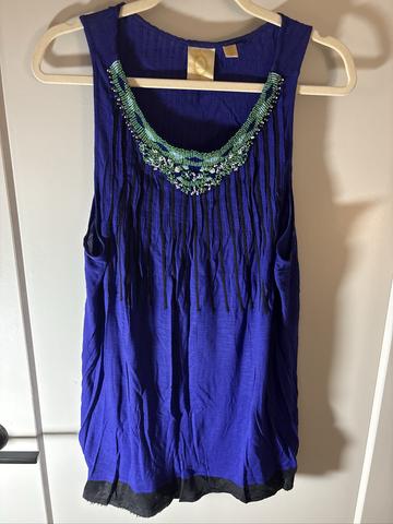 Beaded swing tank