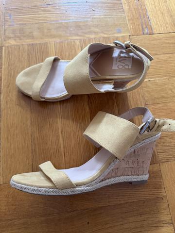 Yellow wedge shoe
