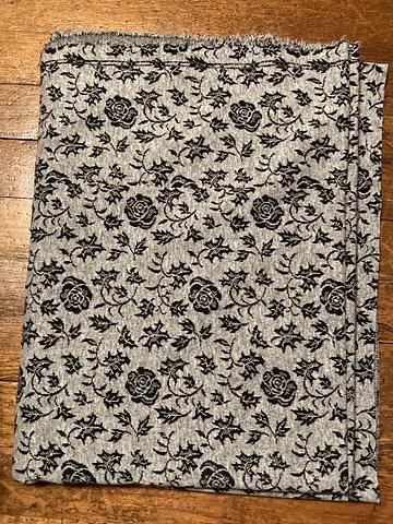 Gray and black floral knit fabric