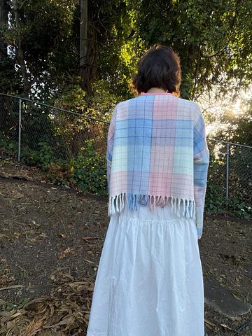pink and blue coat, fringe