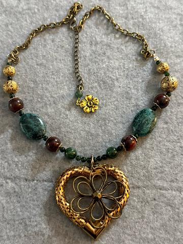 Heart and gemstone pendant