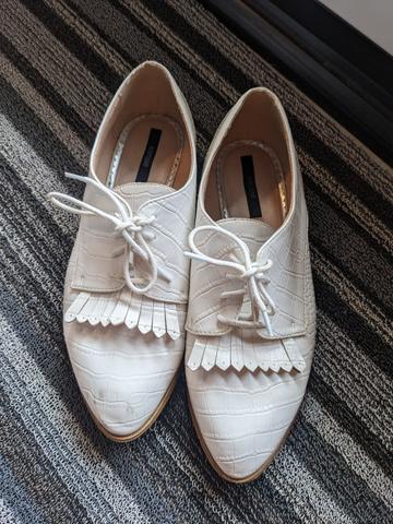 White loafers