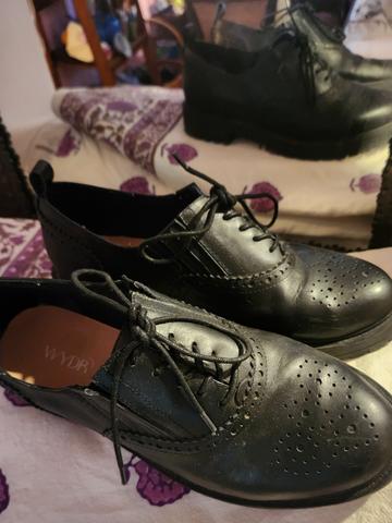 Wydr Studios Jenna Oxfords in black leather, featuring a classic brogue lace-up design with heart-shaped perforated toe details and a chunky lug sole.