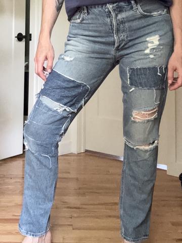 Distressed slouchy slim jeans