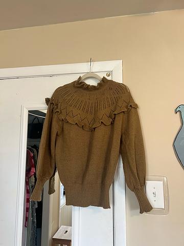 clovis ruffin knit
