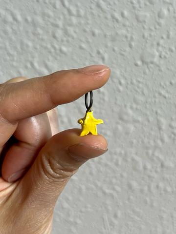 Imperfect lumpy ceramic star charm