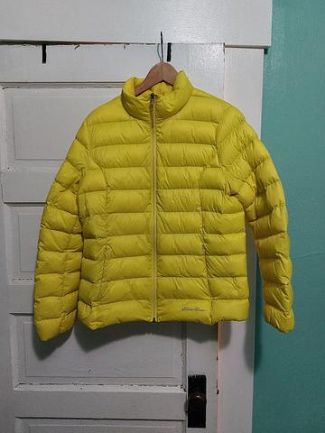 Neon yellow puffer coat