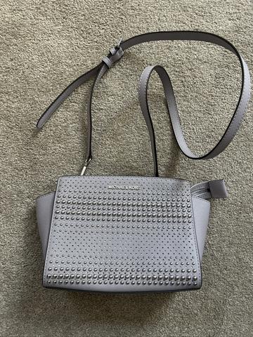 Lavender leather purse with silver rounded studs