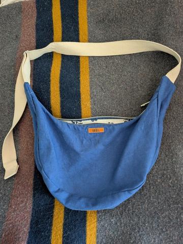 Handmade crescent crossbody bag