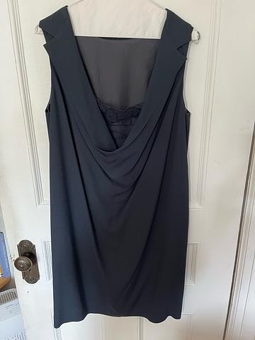 Navy blue sleeveless sheath dress with lace detail