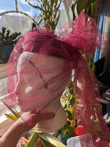 Burgundy pillbox hat with veil