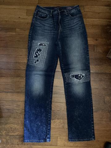 Visibly mended jeans